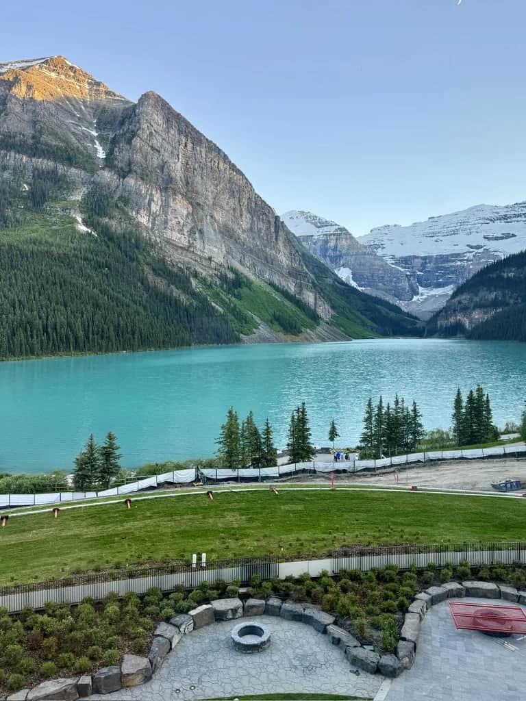 Turquoise water below snow streaked peaks, seen from the terrace, Lake Louise